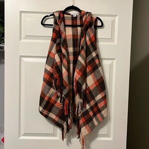 Fall vest in orange/brown plaid with hood, pockets and fringe detail, sz S